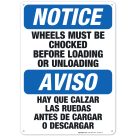 Wheels Must Be Chocked Before Loading Or Unloading Bilingual Sign, OSHA Notice Sign