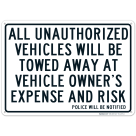 All Unauthorized Vehicles Will Be Towed Sign