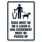 Dogs Must Be on A Leash And Dog Excrement Must Be Picked Up Sign