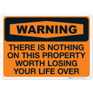 There Is Nothing On This Property Worth Losing Your Life Over Sign