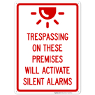 Trespassing On These Premises Will Activate Silent Alarms Sign