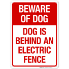 Dog Is Behind An Electric Fence Sign