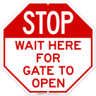 Stop Wait Here For Gate To Open Sign