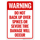 Warning Do Not Back Up Over Spikes Or Severe Tire Damage Will Occur Sign