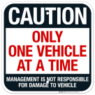 Caution Only One Vehicle At A Time Management Is Not Responsible For Damage Sign