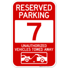 Reserved Parking Number 7, Red Unauthorized Vehicles Towed Away Sign
