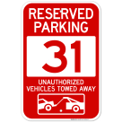 Reserved Parking Number 31, Red Unauthorized Vehicles Towed Away Sign
