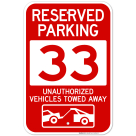 Reserved Parking Number 33, Red Unauthorized Vehicles Towed Away Sign
