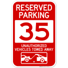 Reserved Parking Number 35, Red Unauthorized Vehicles Towed Away Sign