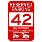 Reserved Parking Number 42, Red Unauthorized Vehicles Towed Away Sign