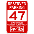 Reserved Parking Number 47, Red Unauthorized Vehicles Towed Away Sign