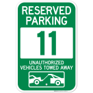 Reserved Parking Number 11, Green Unauthorized Vehicles Towed Away Sign