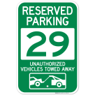 Reserved Parking Number 29, Green Unauthorized Vehicles Towed Away Sign