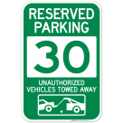 Reserved Parking Number 30, Green Unauthorized Vehicles Towed Away Sign