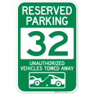 Reserved Parking Number 32, Green Unauthorized Vehicles Towed Away Sign