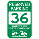 Reserved Parking Number 36, Green Unauthorized Vehicles Towed Away Sign