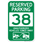 Reserved Parking Number 38, Green Unauthorized Vehicles Towed Away Sign