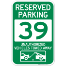 Reserved Parking Number 39, Green Unauthorized Vehicles Towed Away Sign