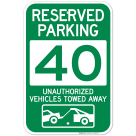 Reserved Parking Number 40, Green Unauthorized Vehicles Towed Away Sign