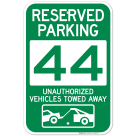 Reserved Parking Number 44, Green Unauthorized Vehicles Towed Away Sign
