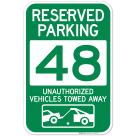 Reserved Parking Number 48, Green Unauthorized Vehicles Towed Away Sign