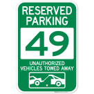 Reserved Parking Number 49, Green Unauthorized Vehicles Towed Away Sign