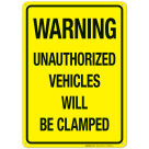 Warning Unauthorized Vehicles Will Be Clamped Sign