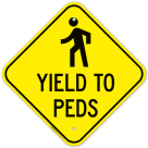 Yields To Peds With Graphic Sign