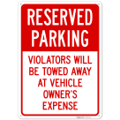 Reserved Parking Violators Towed Away At Vehicle Owner's Expense Sign,