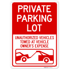 Private Parking Lot Unauthorized Vehicles Towed At Owner Expense Sign,
