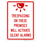 Trespassing On These Premises Will Activate Silent Alarms Sign